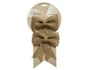 Deco Noel a suspendre jute nœud argent pailette 13x12x1,5cm -unite