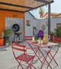 Table de jardin FERMOB Bistro rectangulaire rouge 2 personnes