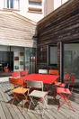 Table de jardin FERMOB Cargo carré rouge 8 personnes