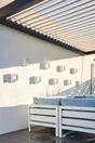 Pergola bioclimatique adossée Caleta aluminium, 12 m² gris anthracite