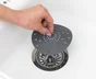 Tamis fond d'évier silicone, aspect gomme, gris