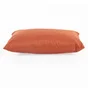 Coussin deperlant 30x50cm uni lava rouge