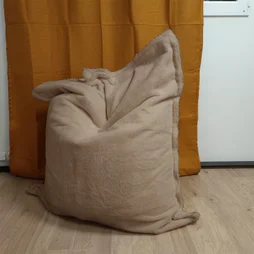 Maxi coussin fausse fourrure 110 x 130 cm peanuts