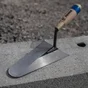 Truelle cazzuola ronde en acier traite lame de 24cm revex