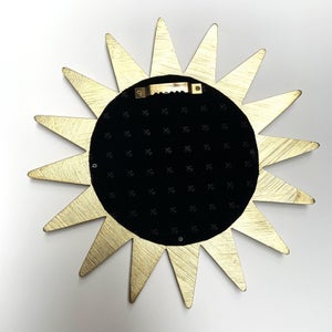 Miroir soleil blanc et doré diam.28cm