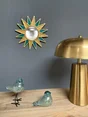 Miroir soleil bleu et doré diam.28cm