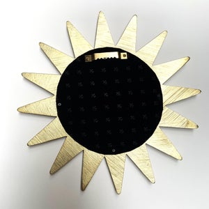Miroir soleil bleu et doré diam.28cm