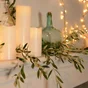 Guirlande lumineuse int/ext flicker 128 led clignotante blanc chaud cable vert 8m