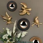 Miroir rond résine noir Fleur diam.26 cm
