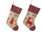Chaussette polyester motif cerf ou sapin tons beige/rouge 45x25x1cm